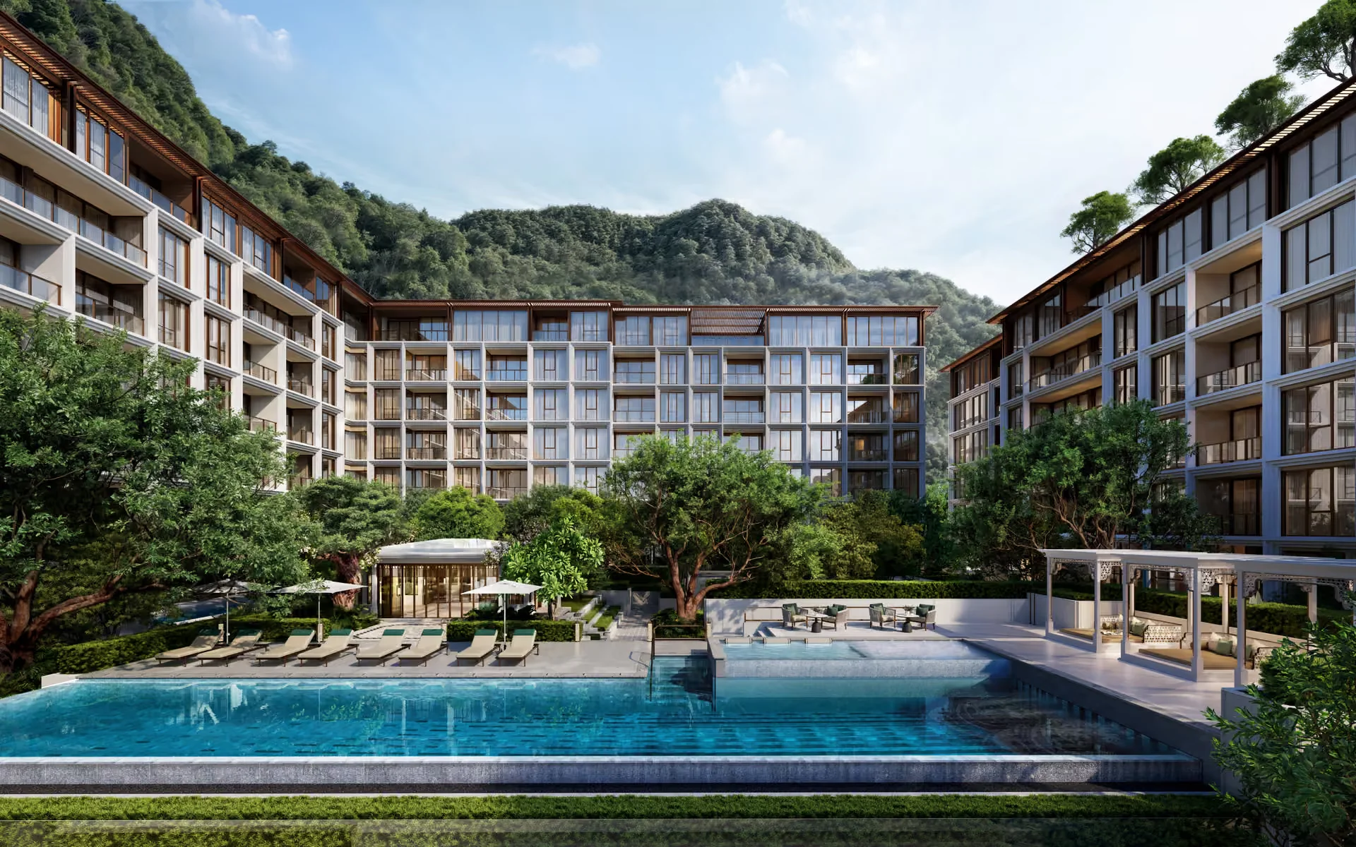 Swimming pool area with lounge chairs at The Residences at InterContinental Phuket Resort, Thailand