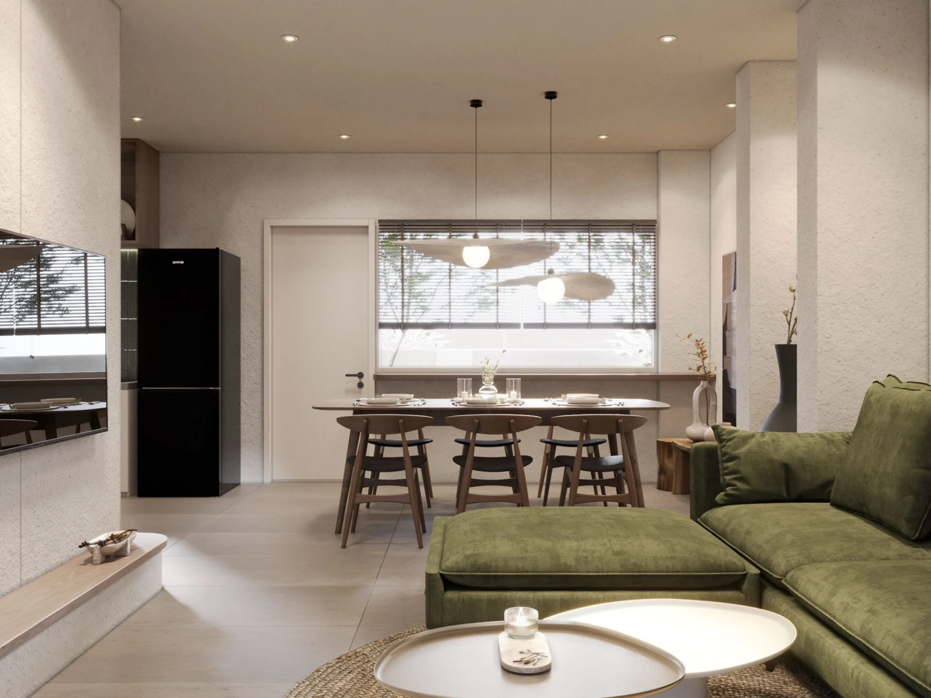 Living and dining area interior in a 3-bedroom townhouse at MIDORI, Central Phuket, Thailand